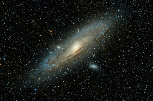 Beginner astronomer looking through a telescope at planets in the night sky — how to find and view planets with a telescope