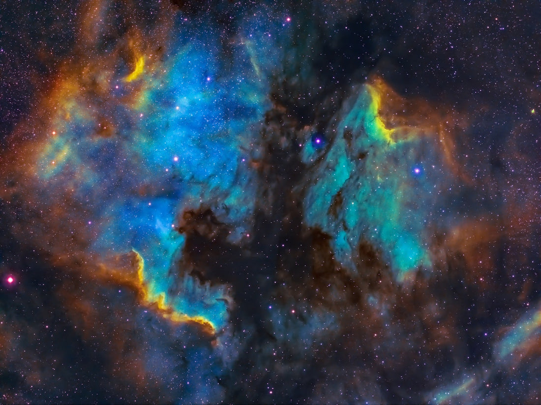 Entry-level refractor telescope set up outdoors at night — best telescopes under $100 for beginner astronomers